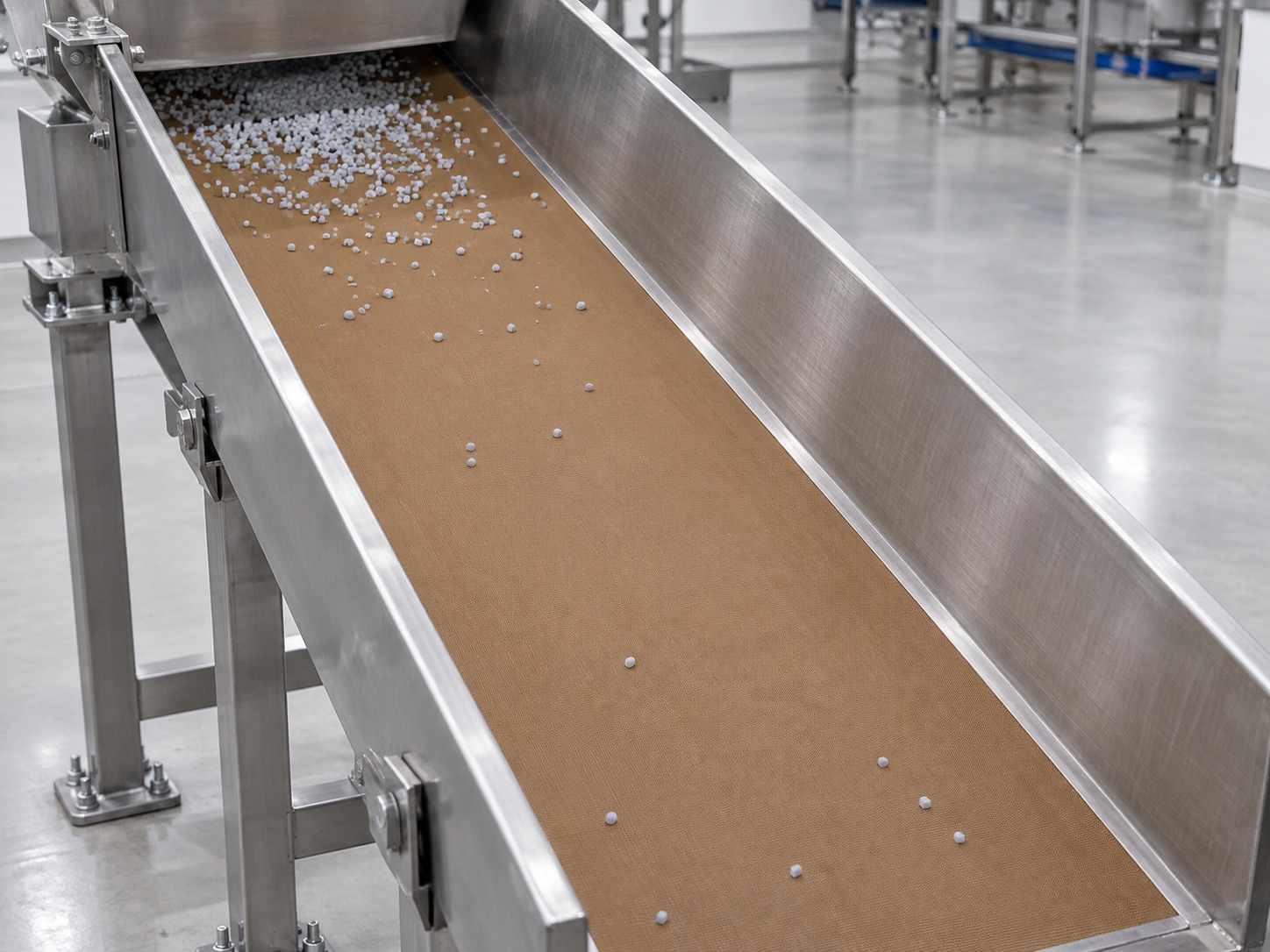 PTFE-coated glass fabric tape lining hopper and chute contact surfaces