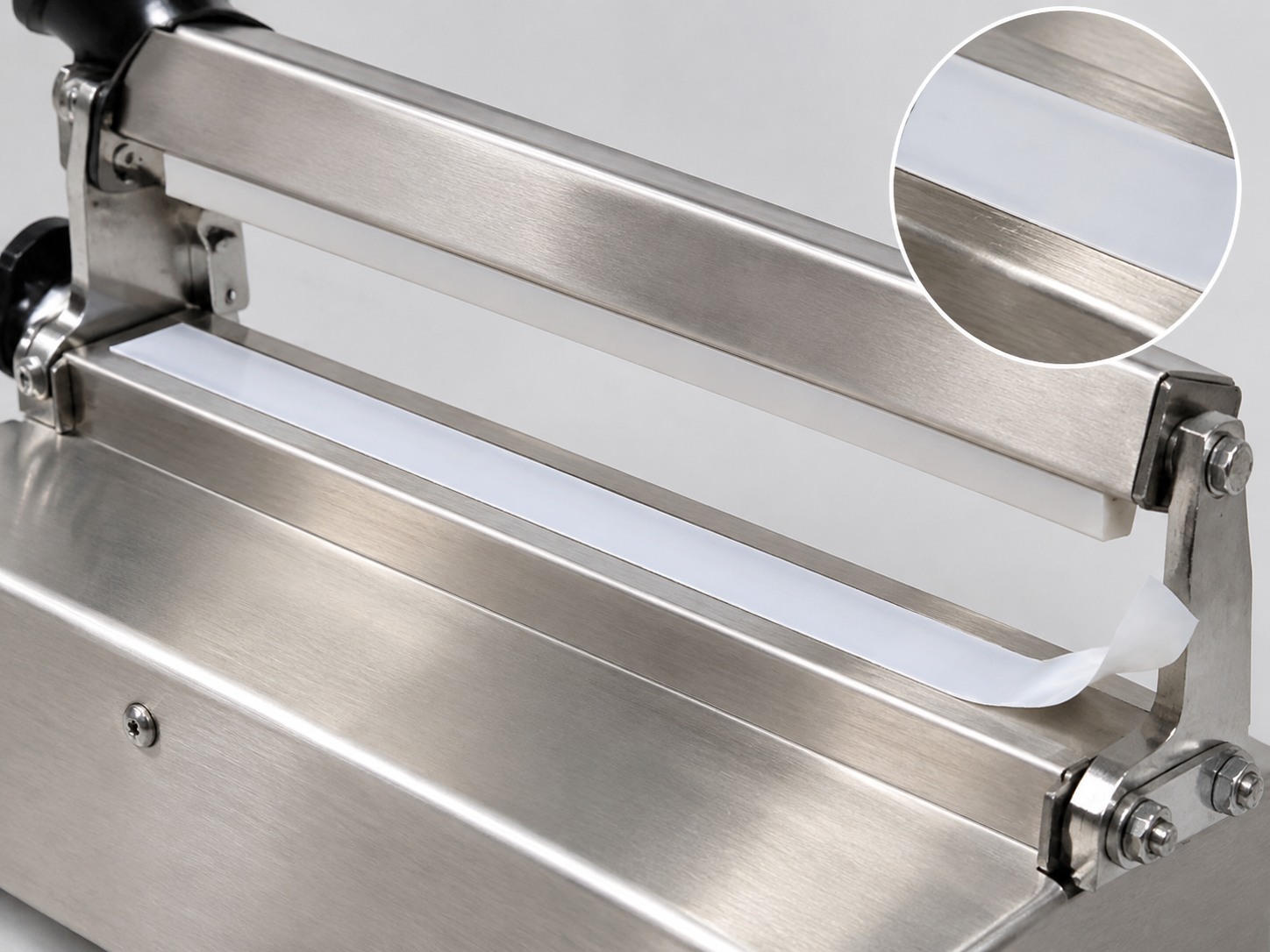White PTFE film tape protecting a heat-sealing contact surface